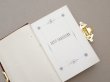 画像9:  アンティーク ミサ典書 ブラウンのベルベット 聖母マリアと幼いキリストのモチーフ付 四葉のクローバーの押し花入り (9)